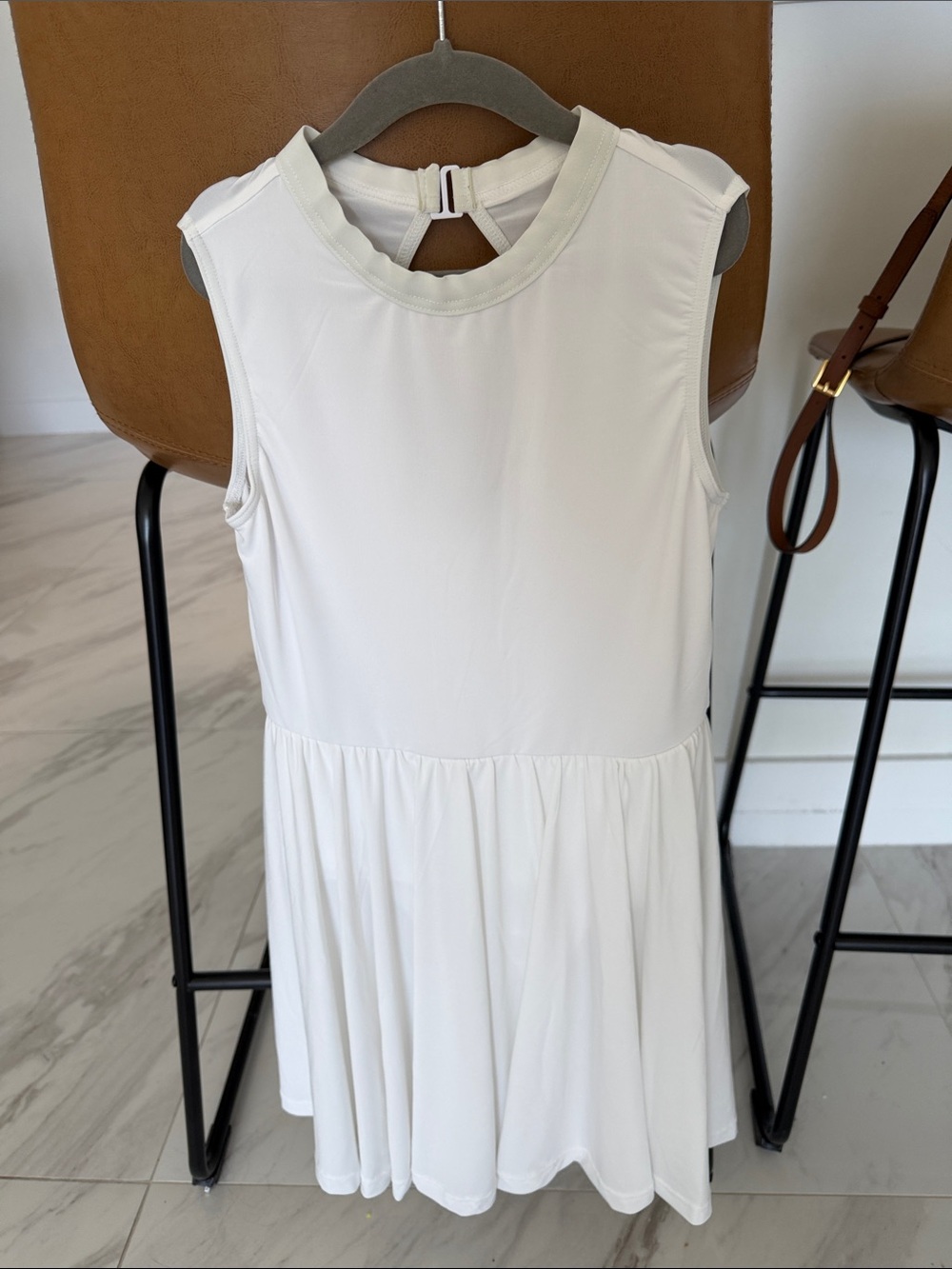 White Sleeveless one piece with Keyhole Back
